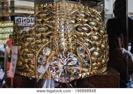 DUBAI, UNITED ARAB EMIRATES - DECEMBER 7, 2016: Largest Gold Ring in the world in Deira Gold Souk. The Najmat Taiba or Star of Taiba weighs almost 64 kilograms.