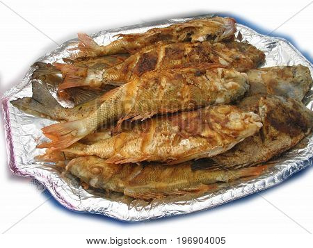 Fried fish piled on top of a platter with aluminum foil
Fried fish is an all time favorite viand in the Philippines and southeast asian countries. It is usually eaten with soy sauce and vinegar dipping