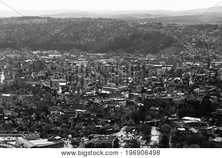 MARBURG GERMANY - APRIL 18 2015: The new and the old part of the city from the surrounding hills. Black and white. Marburg is a university town in the German federal state (Bundesland) of Hessen.