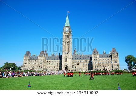 OTTAWA, CANADA - AUG. 23, 2011: The Changing Guard Ceremony takes place at Parliament Hill in Ottawa, Canada. The ceremony is performed in every day in the summer months.
