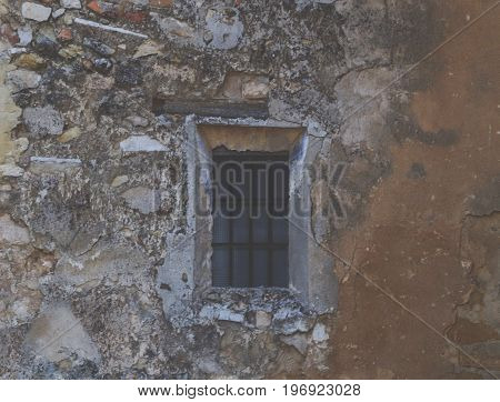 Old window in a wall of the same type