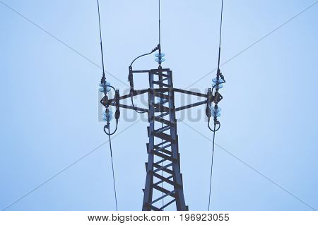 High voltage tower in the middle of the sky
