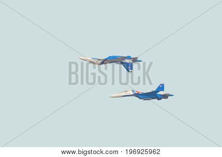 BELGOROD RUSSIA - JULY 15 2017: Russian military jet fighters su-30 sm Flanker-C. Aerobatics pair performed the 