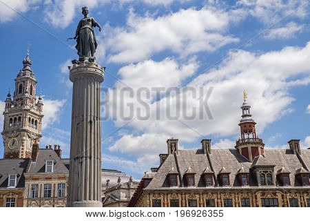 View in Grand Place in the historical city of Lille France. The view includes the Column of the Goddess Vieille Bourse and the chamber of Commerce and Industry.