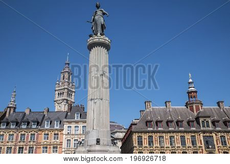 View in Grand Place in the historical city of Lille France. The view includes the Column of the Goddess Vieille Bourse and the chamber of Commerce and Industry.