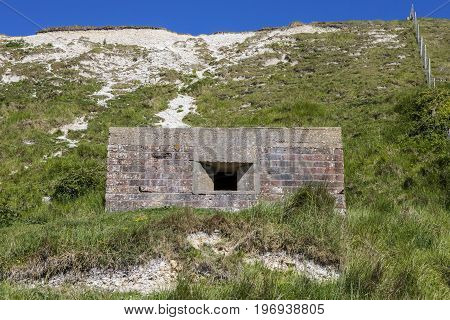 A panoramic view showing World War II defences at the estuary in Cuckmere Haven situated in the Seven Sisters Country Park in East Sussex UK.