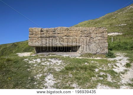 A panoramic view showing World War II defences at the estuary in Cuckmere Haven situated in the Seven Sisters Country Park in East Sussex UK.