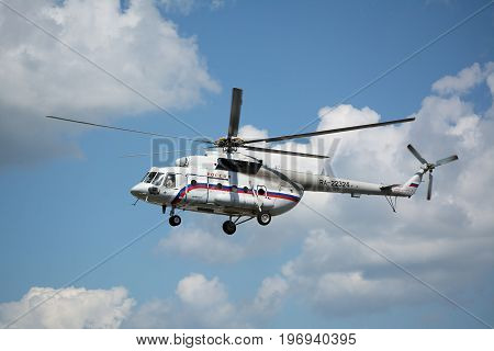 Yoshkar-Ola, Russia - Jule 19, 2017 Presidential helicopter of Vladimir Putin Mil Mi-8 in the sky over Yoshkar-Ola, Russia