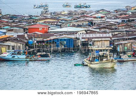 Semporna,Sabah,Malaysia-Apr 22,2017:View of Semporna bajau water village in Semporna,Sabah,Malaysia.The water village is a popular tourist attraction place in Semporna,Sabah,Borneo,Malaysia