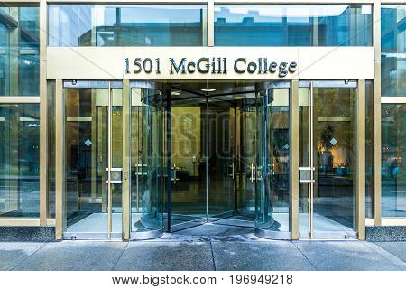 Montreal, Canada - May 26, 2017: Mcgill College University Entrance With Modern Glass And Gold Door