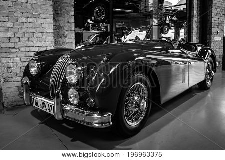 BERLIN - MAY 10 2015: The roadster Jaguar XK140. Black and white. 28th Berlin-Brandenburg Oldtimer Day