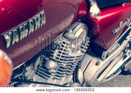BERLIN - MAY 10 2015: Detail of motorcycle Yamaha XV 750 Special. Focus on the center. Stylization. Vintage toning. 28th Berlin-Brandenburg Oldtimer Day