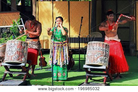 Honolulu Hawaii - May 27 2016: A group of Tongan entertainers perform for audiences at the Polynesian Cultural Center a popular tourist attraction on Oahu.