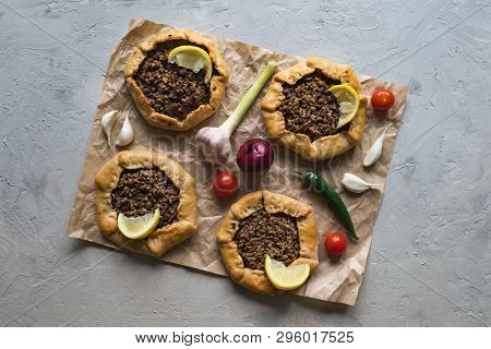 Beef Mince Sfiha - Arabian Opened Meat Pies On Gray Background.