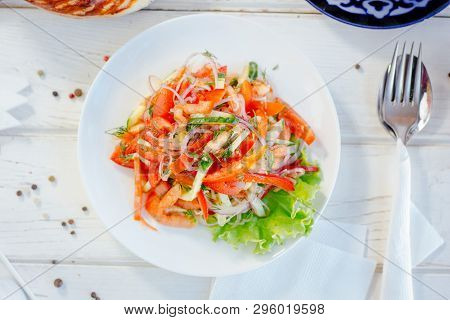 Achik-chukchuk Salad With Tomatoes And Onion At White Plate, Top View, Great Image For Your Needs.