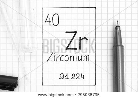 The Periodic Table Of Elements. Handwriting Chemical Element Zirconium Zr With Black Pen, Test Tube 