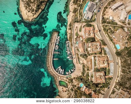 Beautiful birdeye view on the sea coastline with pier and yakhts at sunny day. Travell, jorney,islands, Seascape, freedom, holidays concept.