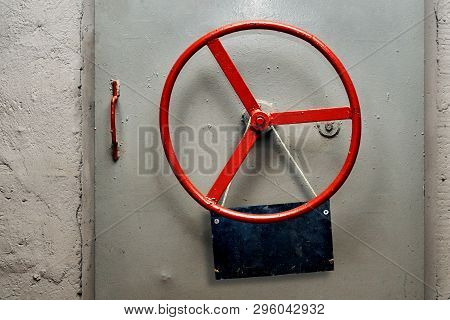 Empty Warning Sign Plate Hanging On A Hermetic Bomb Shelter Armored Door