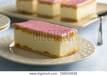 Dutch Tompouce pastry with pink icing close up