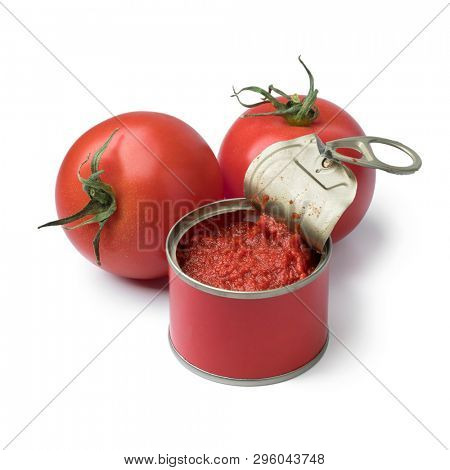 Open can with tomato paste and fresh tomatoes isolated on white background
