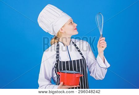 Girl In Apron Whipping Eggs Or Cream. Start Slowly Whisking Whipping Or Beating Cream. Whipping Crea