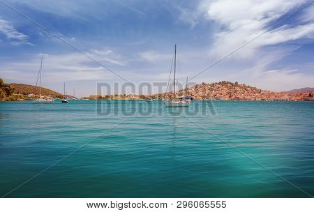 Poros Island In Greece. Panoramic View From The Sea Of Poros Island In Aegean Sea, Greece