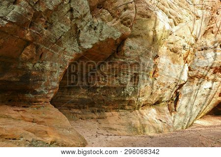 Close Pattern Of A Sand Formations. Sandstone Rock In Spring In Latvia. Langu Cliffs At Lode Behind 