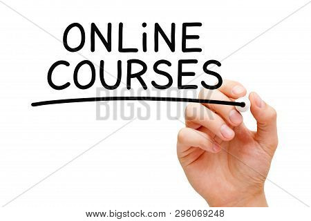 Hand Writing Online Courses With Black Marker On Transparent Wipe Board Isolated On White Background