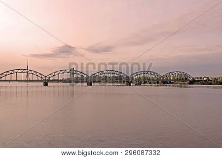 Railway Bridge Over The River Daugava And Tv Tower In Riga In The Morning, Latvia