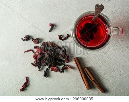 Transparent Glass Cup With Hot Red Tea From Hibiscus Or Hibiscus.