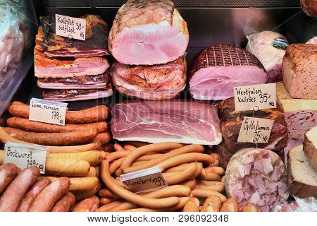 Meat Store In Gothenburg Market Hall (saluhallen), Sweden. Various Smoked Hams, Bacons, Sausages, Wi