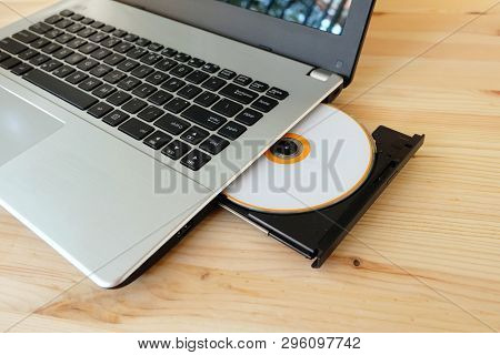Cd Dvd Drive Writer Burner Reader Internal Of Laptop Computer On Wooden Background
