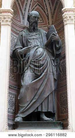 FLORENCE, ITALY - JANUARY 09, 2019: Saint John the Evangelist by Baccio da Montelupo, Orsanmichele Church in Florence, Tuscany, Italy