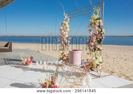 Event Decoration. Wedding Chuppa At Riverside Decorated With Fresh Flowers. Florist Workflow.