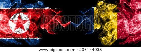 North Korea Vs Chad, Chadian Smoky Mystic Flags Placed Side By Side. Thick Colored Silky Smoke Flags