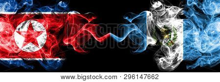 North Korea Vs Guatemala, Guatemalan Smoky Mystic Flags Placed Side By Side. Thick Colored Silky Smo