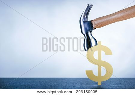 Hammer Hitting Cracked Dollar. Symbol Strength Dollar. Copy Space. Business, Money, Finance Concept.