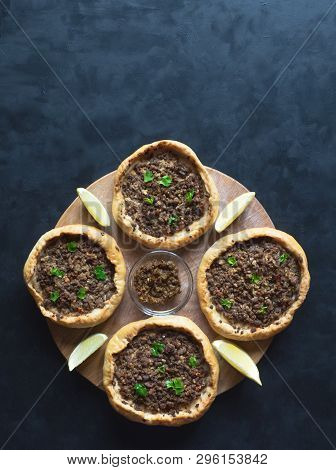 Beef Mince Sfiha - Arabian Opened Meat Pies On Black Background.