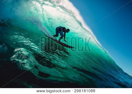 April 18, 2019. Bali, Indonesia. Surfer Ride On Barrel Wave. Professional Surfing At Big Waves In Pa