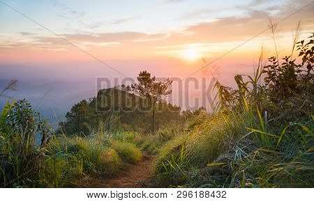 Gold Sunset And Purple Light Phu Nom At Phu Langka National Park Thailand With Fog On Sky Wide. Phu 