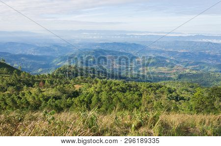 Grass Field On Mountain With Sky And Cloud At Phu Langka National Park Phayao Thailand. Landscape Mo