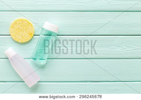 Skin Care Cosmetics With Facial Tonic, Mycelial Water And Sponge On Mint Greem Background Top View M