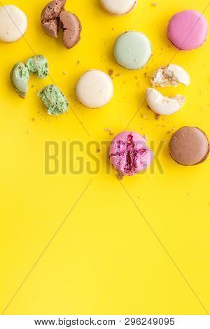 Brignt Macarons For Sweet Break On Yellow Background Top View Mock Up