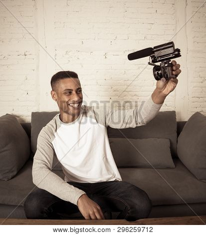 Young Happy Blogger Recording Video On Camera For Internet Blog