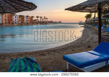 View Of A Lagoon Of The Red Sea At Sunrise Between Two Rows Of Hotel Room In Hurghada