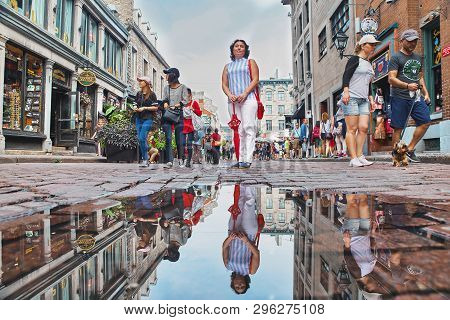 Montreal, Canada, September 3, 2018: Portrait Of Woman, Street Scene On Famous Saint-paul Street In 