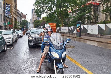 Montreal, Canada, September 3, 2018: Joyful Reaction To Tourists Among Residents In Old Montreal Loo
