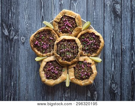 Open Meat Pies On Dark Wooden Background. Top View.