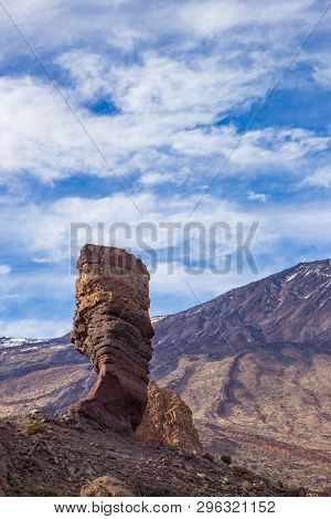 Panoramic View Of Unique Roque Cinchado Unique Rock Formation With Famous Pico Del Teide, Tenerife