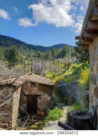 Fikardou Village Scene With Traditional Architecture And Surrounding Landscape. The Village Located 